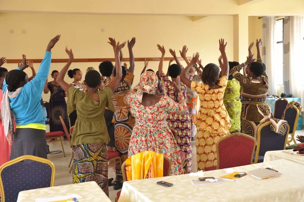 Women survivors dancing at a women survivors retreat
