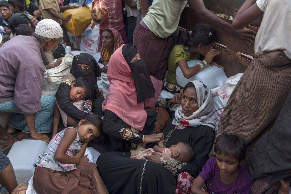 Rohingya women and children gathered together